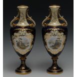 A pair of Coalport two handled pedestal ovoid vases, painted by P. Simpson, signed, with ruins,