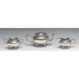 A Chinese silver three piece tea service, comprising teapot, milk jug and sugar basin, faux bamboo