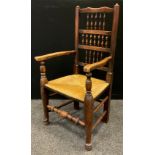A Victorian Lancashire oak spindle-back kitchen chair, rush seat, c.1880