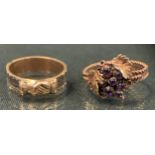 A 19th century mourning ring, clasped hands crest above hairwork channelled shank, unmarked, size H,