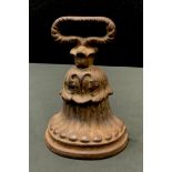 A Victorian cast iron door stop, by Archibald Kenrick & Sons of West Bromwich, in relief with