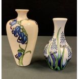 A contemporary Moorcroft ovoid vase, tube lined with blue harebells on a cream ground, 17.5cm