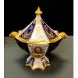 An Abbeydale The Churchill Vase, decorated with alternating cobalt blue and white bands and