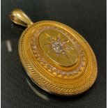 A Victorian diamond set locket, central old cut diamond approx 0.50ct, surround by rose cut accents,