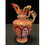 A large Copeland Spode double dragon jug, decorated in iron red, orange and gilt with stylised