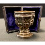 A Victorian silver miniature presentation Gothic font, cast with masks and trefoils, 9cm high, Henry