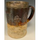 A large 19th century salt glazed stoneware two tone porter mug, in the manner of Mortlake, in relief