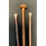 A Victorian silver mounted riding crop; others (3)