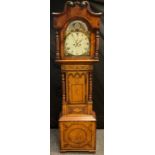 A Victorian oak and mahogany crossbanded longcase clock, the arched painted dial with lunar phase,