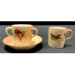 A Royal Worcester miniature coffee cup and saucer, decorated with British birds in flight on a blush