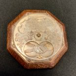 A 19th century oak Tam O'shanter snuff box, the octagonal body with silver plated revolving front,