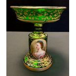 A Bohemian emerald green glass comport, the cylindrical stand with painted oval portrait,