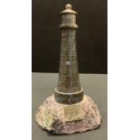 A Cornish serpentine model, of Longships Lighthouse, Land's End, Cornwall, 26cm high, early 20th
