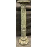 A 20th century large dark green marble statuary stand, fluted column, 107cm high