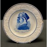 An early 19th century commemorative plate, printed in underglaze blue, with portrait above Long Live