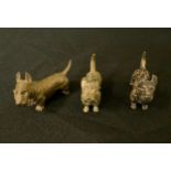 An Austrian cold painted bronze model, of a Scottish Terrier, 3.5cm high, c.1930; others (3)