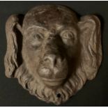 A late 19th century cast iron door plaque, as a dog's head, 16.5cm wide, c.1890