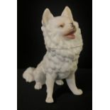 A German Heubach bisque novelty inkewell, in the form of a Spitz, 12.5cm high, impressed mark