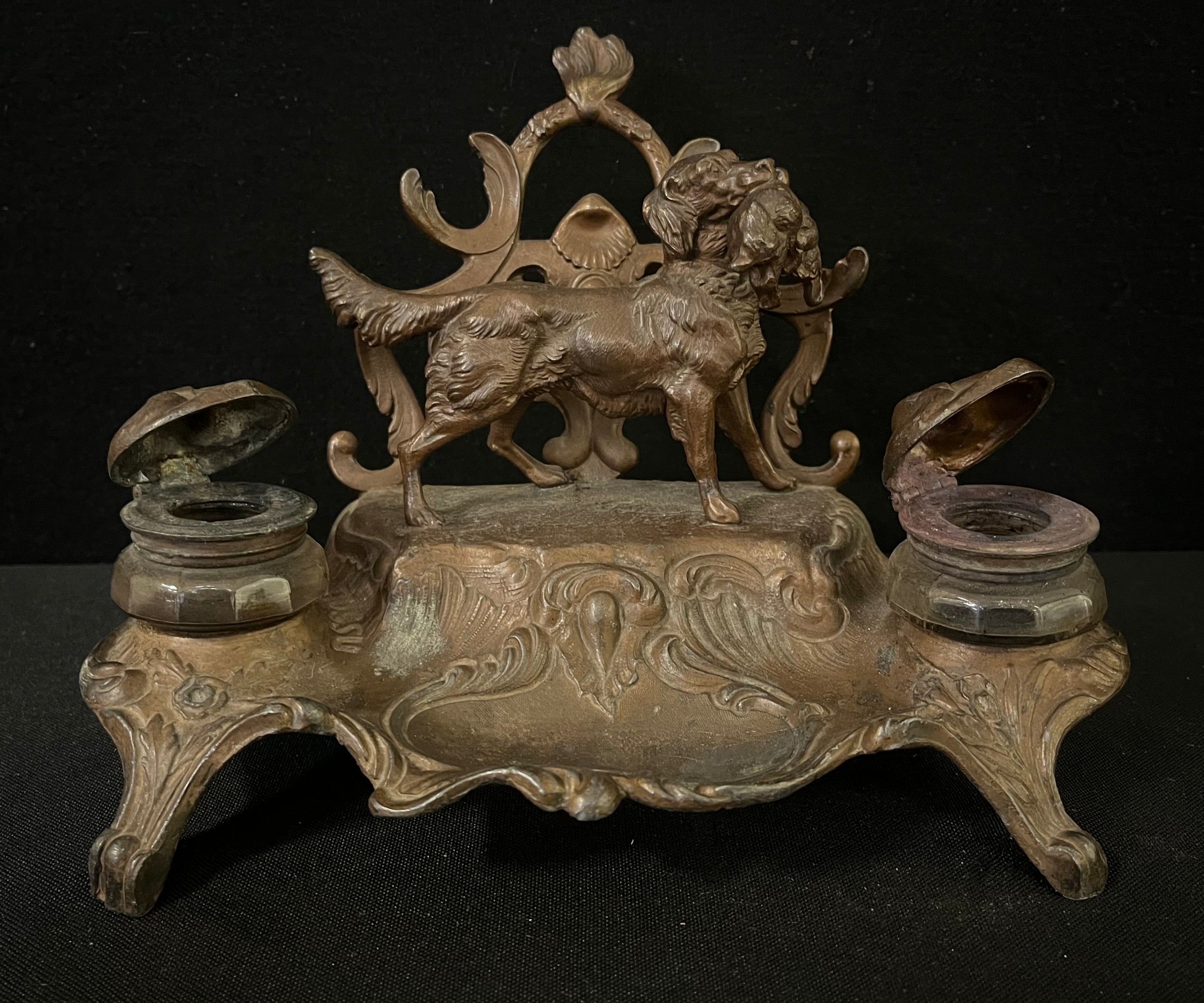 A late 19th century gilt spelter desk stand, with two wells and letter rack, surmounted with a - Image 2 of 3