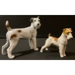 A Karl Ens and Limbach, Germany model, Fox Terrier, 15.5cm high, printed mark; another, 9cm high (2)