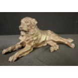 A Kayserzin plated pewter model, of a Retriever, reclining, 24.5cm high, c.1910