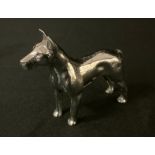 An early 20th century silvered car mascot, of a Bull Terrier, 9cm high, c.1930
