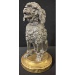 A late 19th century French spelter model, of a Poodle, seated, gilt metal circular base, 13cm