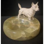 An early 20th century onyx pin dish, mounted with an Austrian cold painted bronzed white Highland