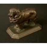 English School, early 20th century, a brown patinated bronze, Newfoundland, canted rectangular base,