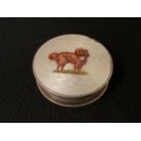 An Edwardian silver trinket box, the cover enamelled with Toy Spaniel, 5.5cm diam, Birmingham 1907