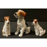 A Royal Worcester model, Fox Terrier, 7.5cm high, printed mark, 2942; others, Royal Doulton (3)