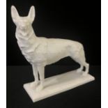 An Austrian Augarten model, of a German Shepherd, rectangular plinth, 16.5cm high, printed mark