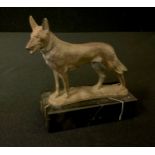 An early 20th century German bronzed metal model, of a Shepherd dog, rectangular marble base, 11.5cm