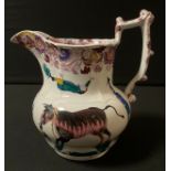 An early 19th century Staffordshire Bull Baiting jug, naively decorated bulldogs, bull and