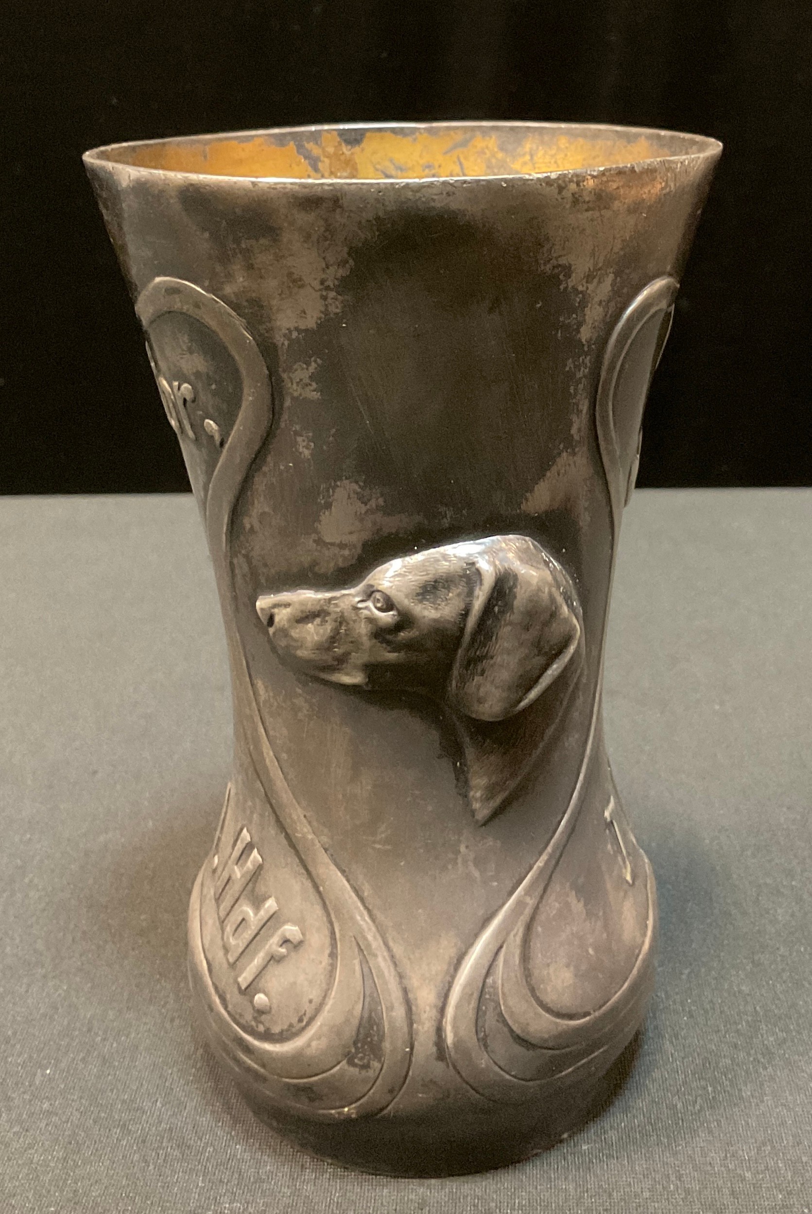 An early 20th century German pewter waisted cylindrical vase, embossed with sinuous scrolls, flowers - Image 3 of 4