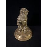 English School, late 19th century, a gilt bronze, after Landseer, Terrier, begging, glass eyes,