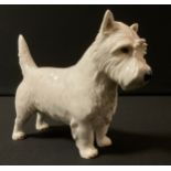 A Nymphenburg model, of a West Highland Terrier, 15cm high, printed mark