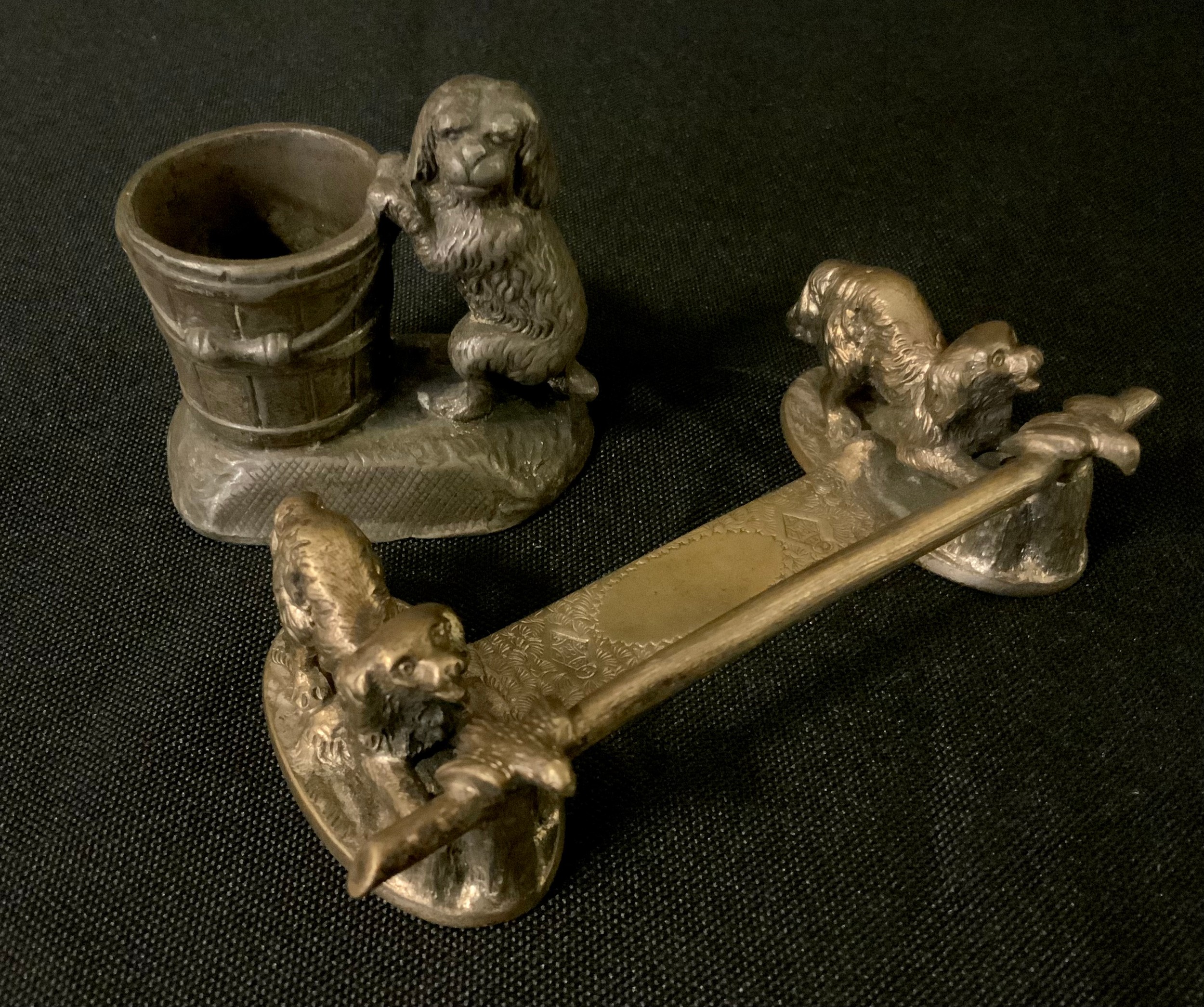 An English silver plated knife rest, the terminals with Toy Spaniels, 10cm wide, registration