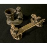 An English silver plated knife rest, the terminals with Toy Spaniels, 10cm wide, registration