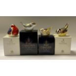 A Royal Crown Derby paperweight, Blackcap Warbler, gold stopper, 12.5cm long, boxed; others, Blue