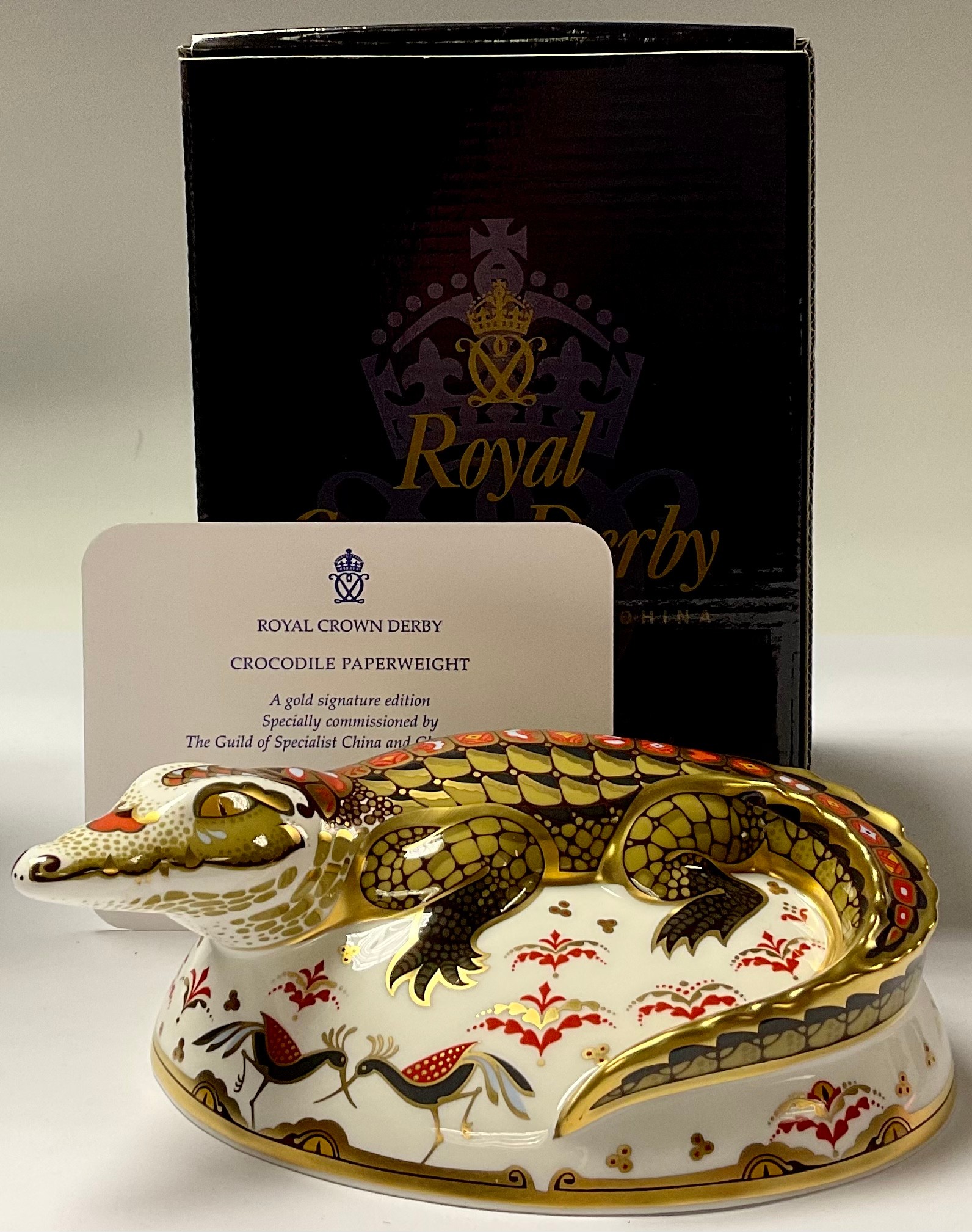 A Royal Crown Derby paperweight, Crocodile, specially commissioned gold signature edition, gold