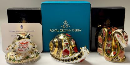 A Royal Crown Derby paperweight, Old Imari Snail, gold stopper, 13cm long, printed mark in grey,