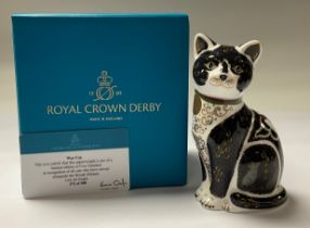 A Royal Crown Derby paperweight, War Cat, in recognition of all cats who have served alongside the