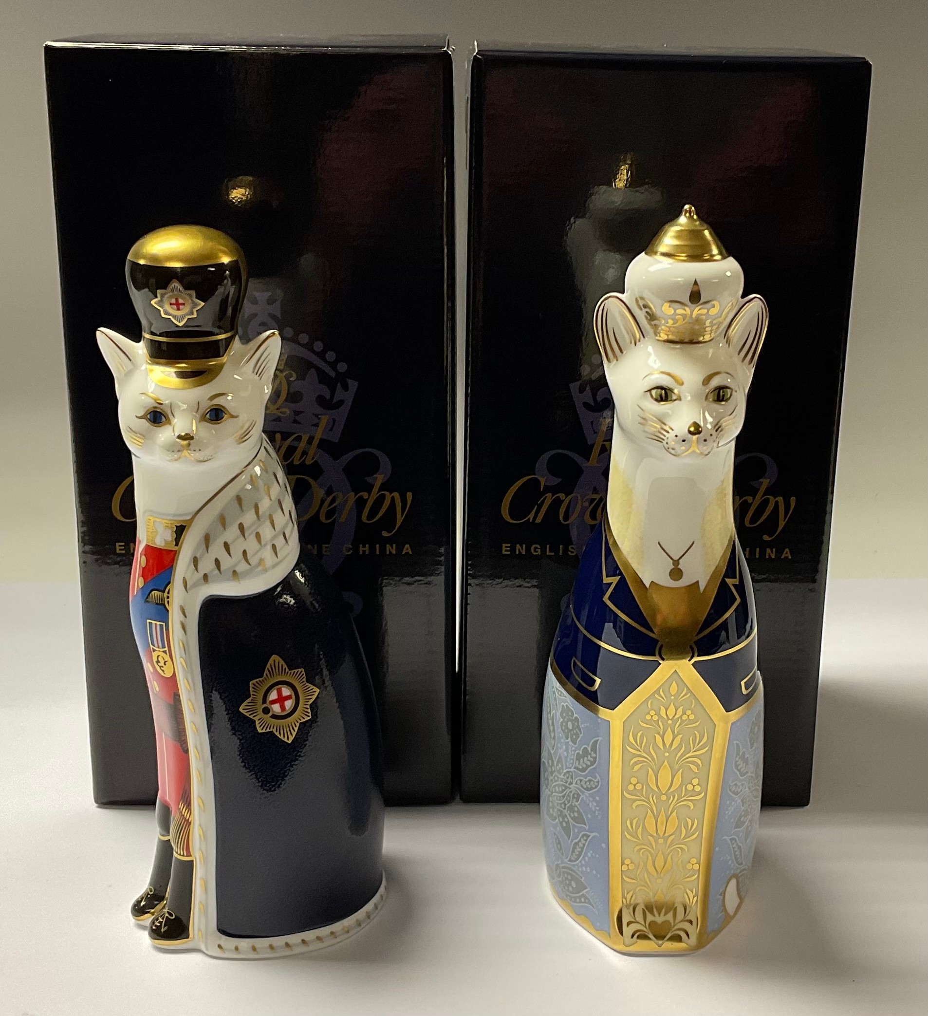 A pair of Royal Crown Derby paperweights, Royal Cat William and Royal Cat Catherine, to celebrate