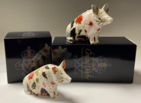 A Royal Crown Derby paperweight, Pig Money Box, gold stopper, 12cm, boxed; another, Sitting Pig,