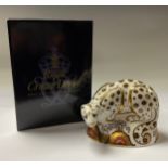 A Royal Crown Derby paperweight, Snow Leopard, silver stopper, boxed