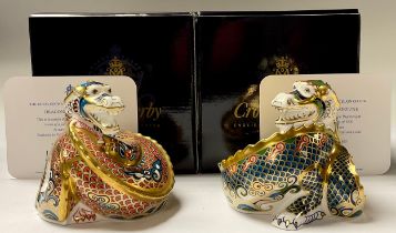 A pair of Royal Crown Derby paperweights, The Dragon of Good Fortune and The Dragon of Happiness,
