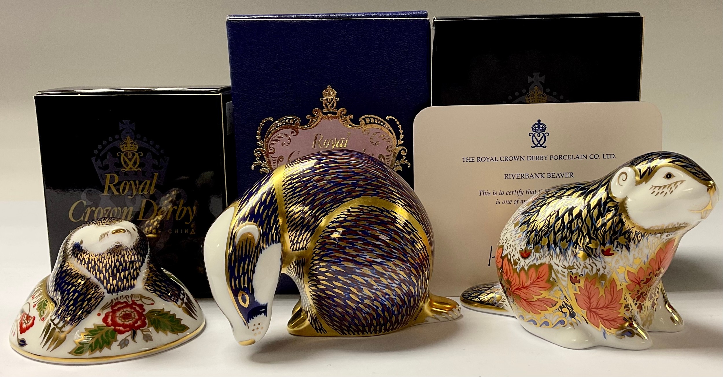 A Royal Crown Derby paperweight, Riverbank Beaver, limited edition 244/5,000, gold stopper, 7.5cm,