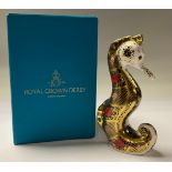 A Royal Crown Derby paperweight, Old Imari Solid Gold Band Seahorse, gold stopper, 16cm, printed