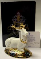 A Royal Crown Derby paperweight, The White Hart Heraldic Stag, limited edition 93/2,000, gold